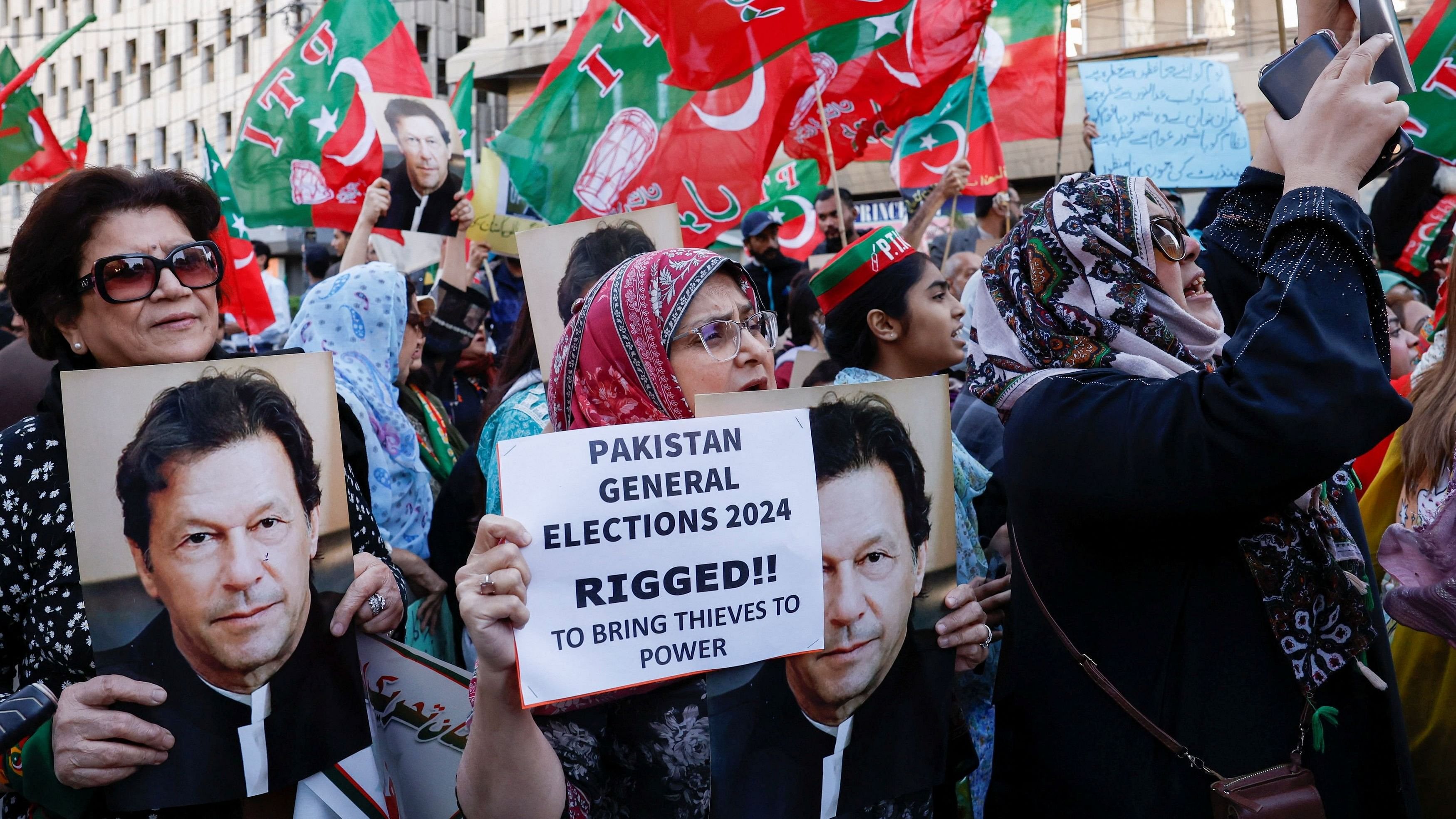 <div class="paragraphs"><p>Supporters of former Prime Minister Imran Khan's party, the Pakistan Tehreek-e-Insaf, protest against what they call, 'blatant rigging in national election'.</p></div>