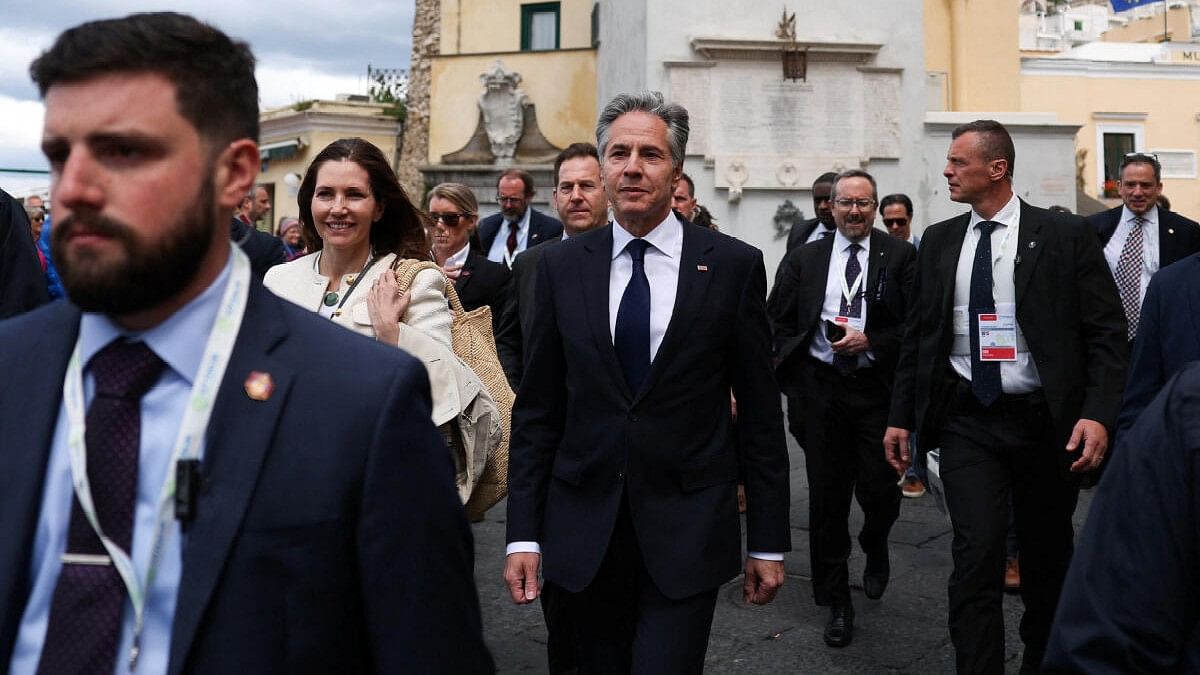 <div class="paragraphs"><p>US Secretary of State Antony Blinken and his wife Evan Ryan walk on the third day of the G7 foreign ministers meeting on Capri island, Italy.&nbsp;</p></div>