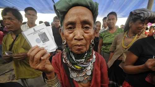 <div class="paragraphs"><p>File photo showing a Nagaland local holding her voter id.</p></div>