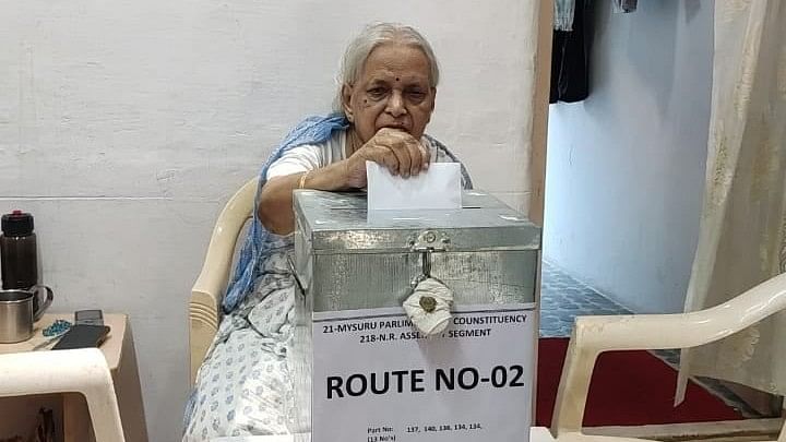 <div class="paragraphs"><p>A senior citizen casts her vote from home.</p></div>