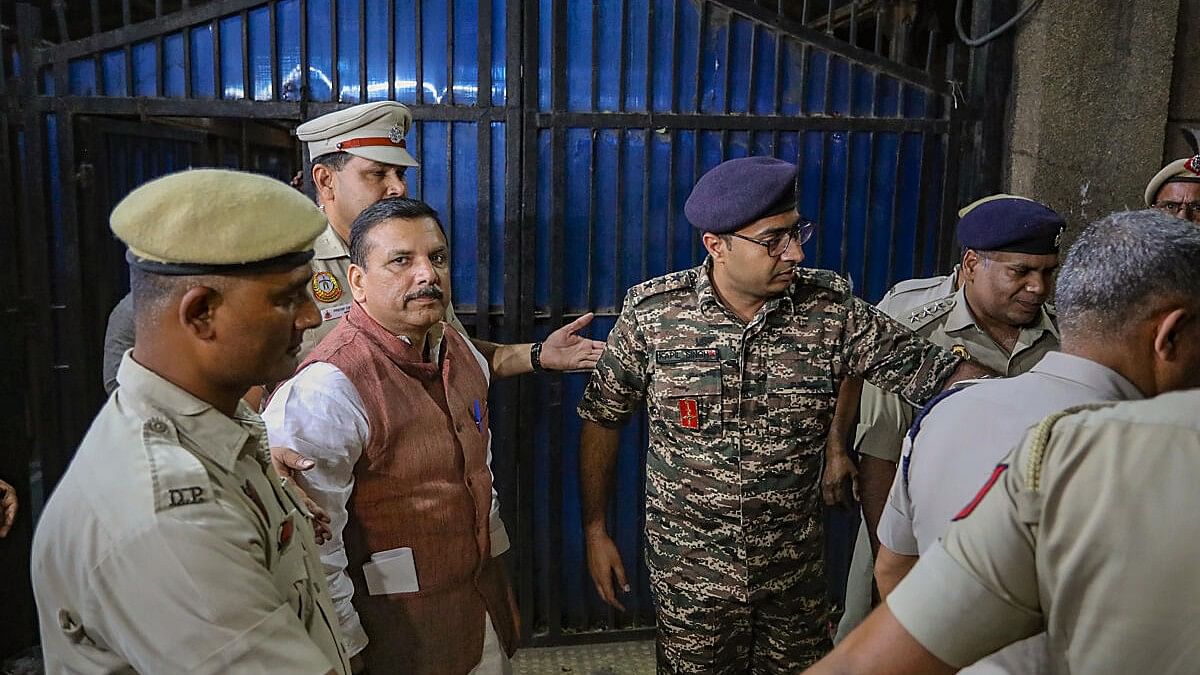 <div class="paragraphs"><p>AAP MP Sanjay Singh, who was behind bars since Oct. 2023 in the liquor policy case, comes out of the Tihar Jail after the Supreme Court granted him bail, in New Delhi, Wednesday, April 3, 2024.</p></div>