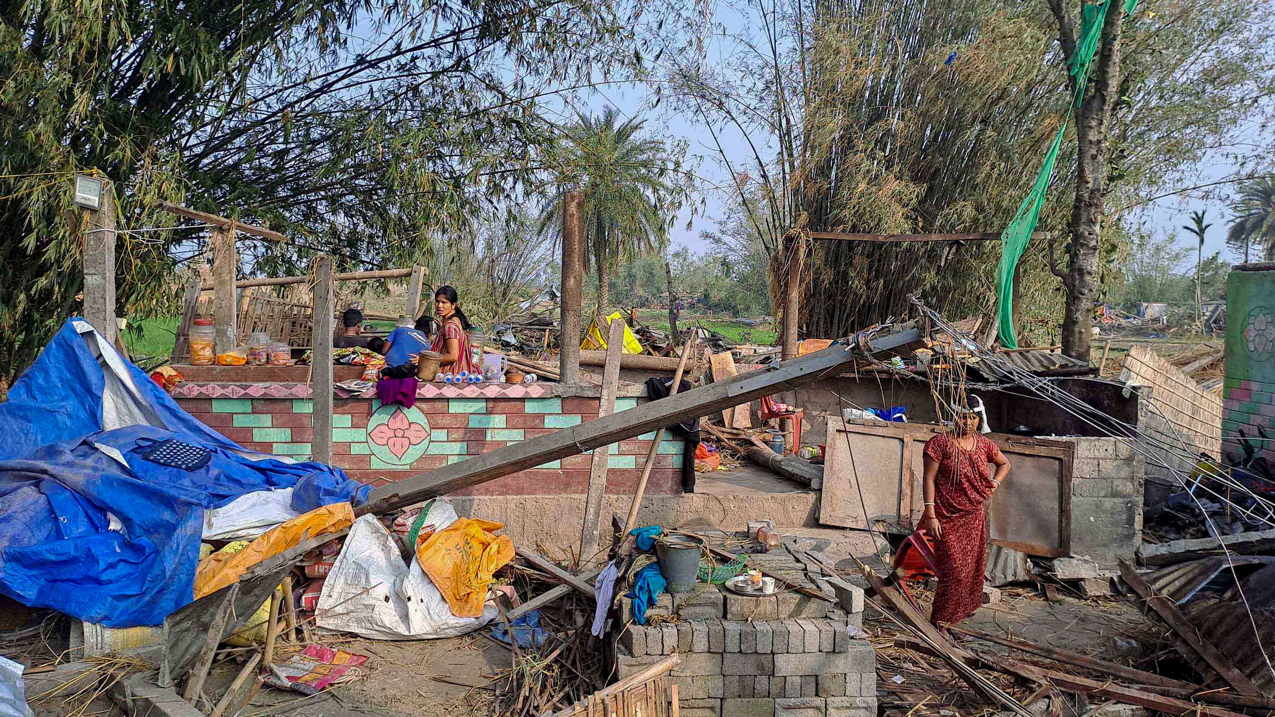 <div class="paragraphs"><p>Damaged houses after a storm in Jalpaiguri district, Monday, Apr. 1, 2024. At least five people were killed and several others suffered injuries after a storm hit parts of West Bengal's Jalpaiguri district.</p></div>