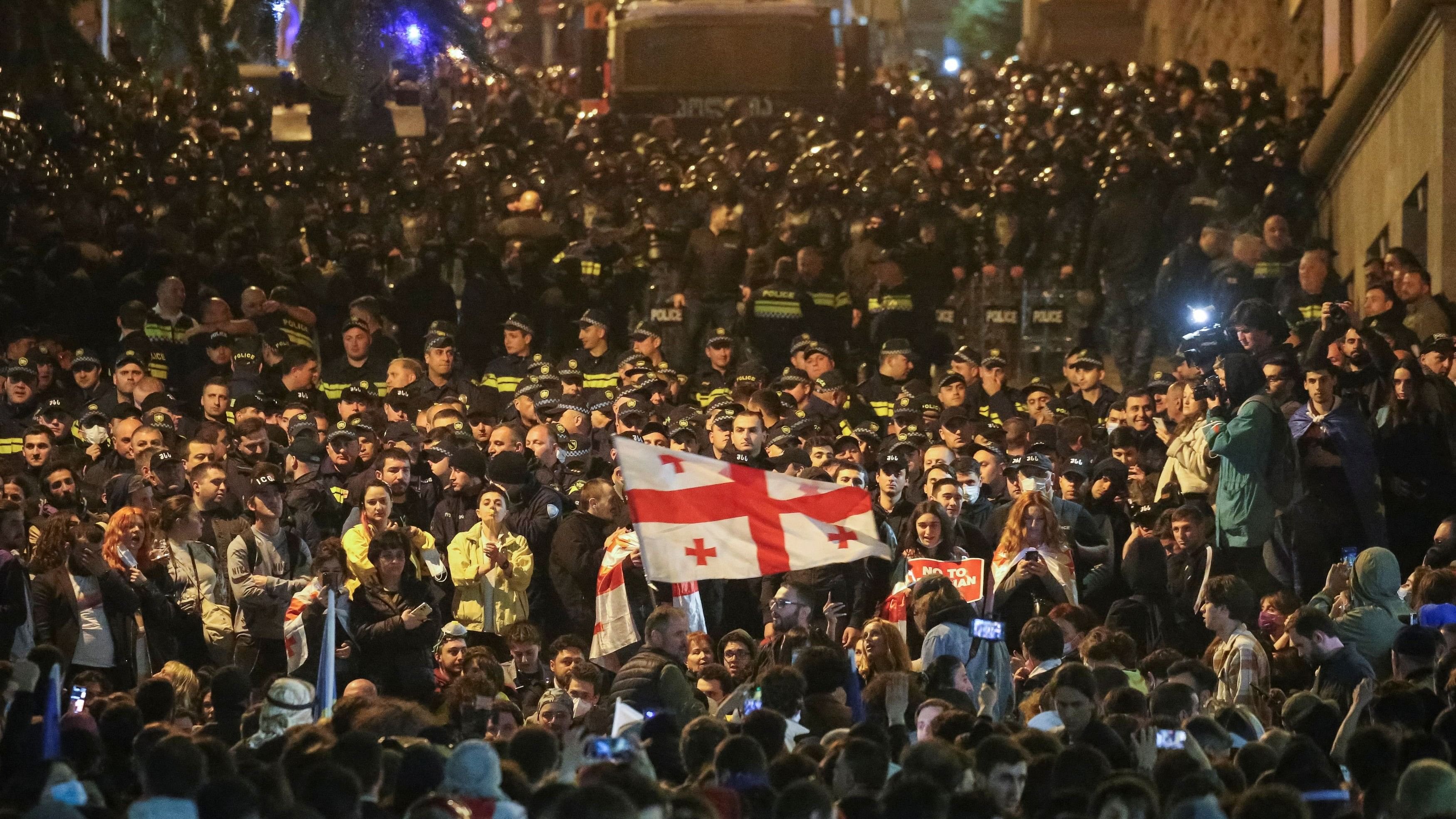 <div class="paragraphs"><p>People take part in a protest against a draft bill on "foreign agents" in Tbilisi, Georgia </p></div>