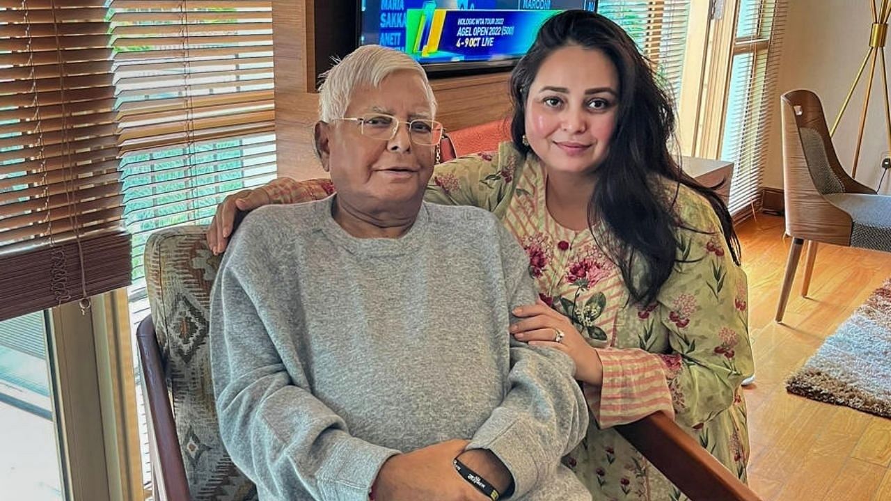 <div class="paragraphs"><p>Rashtriya Janata Dal (RJD) President Lalu Prasad Yadav with his daughter Rohini Acharya. </p></div>