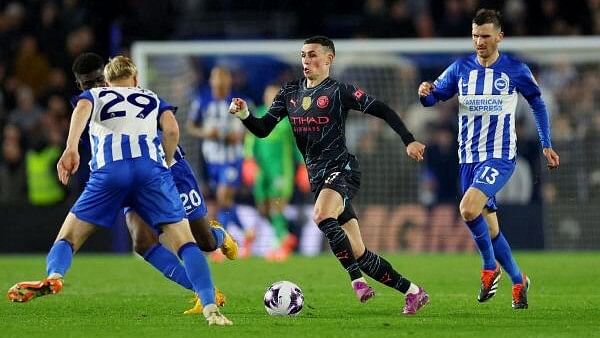 <div class="paragraphs"><p>Phil Foden in action with Brighton &amp; Hove Albion's Jan Paul van Hecke, Carlos Baleba and Pascal Gross.</p></div>