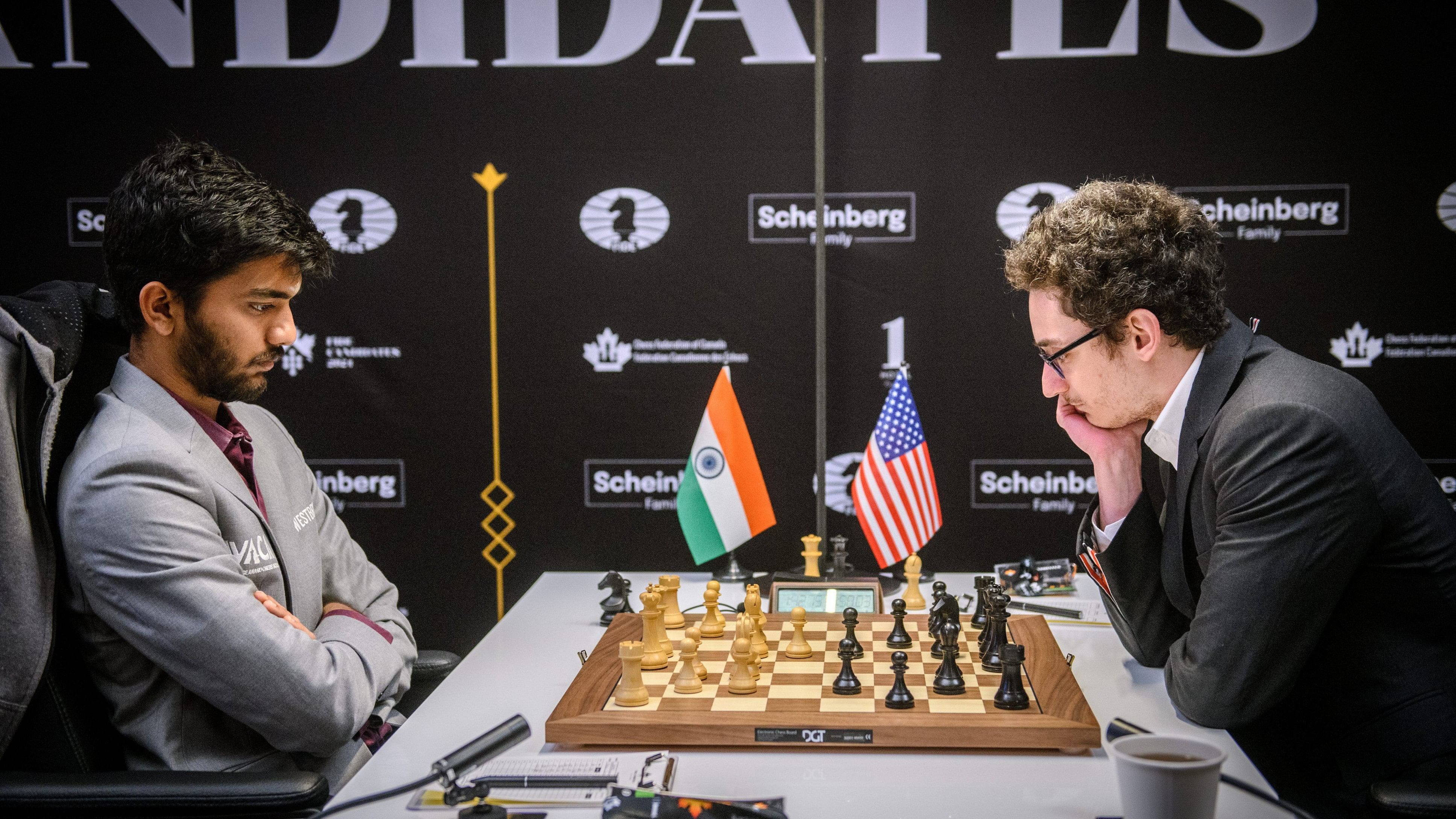 <div class="paragraphs"><p>Grandmaster D. Gukesh of India and Grandmaster Fabiano Caruana of USA during their Round 11 match at the FIDE Candidates 2024 chess tournament, in Toronto, Canada, Wednesday, April 17, 2024. </p></div>