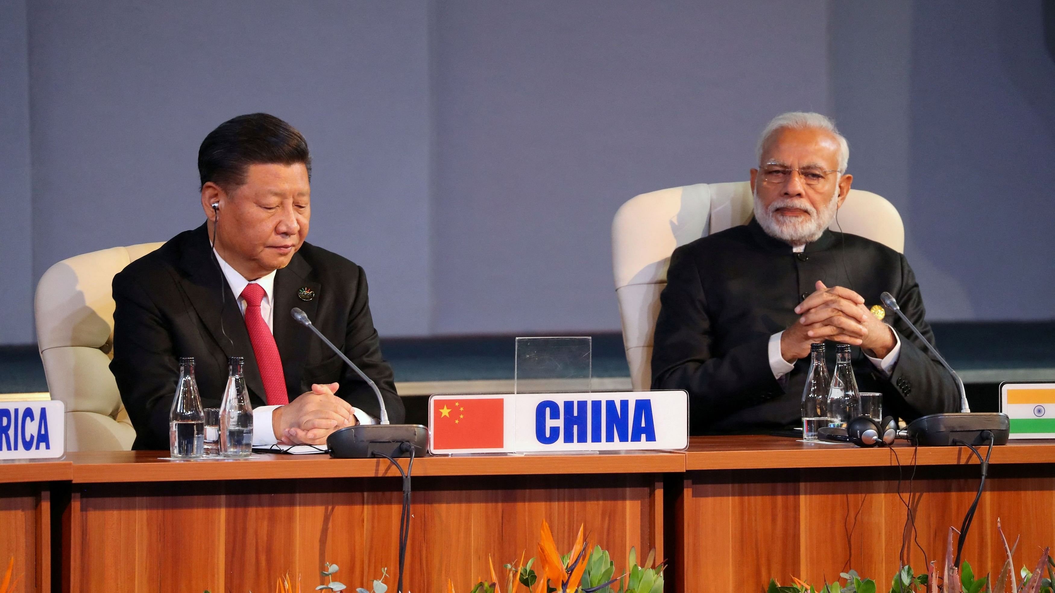 <div class="paragraphs"><p>Prime Minister Narendra Modi and China's President Xi Jinping attend the BRICS summit meeting in Johannesburg, South Africa, July 27, 2018.</p></div>