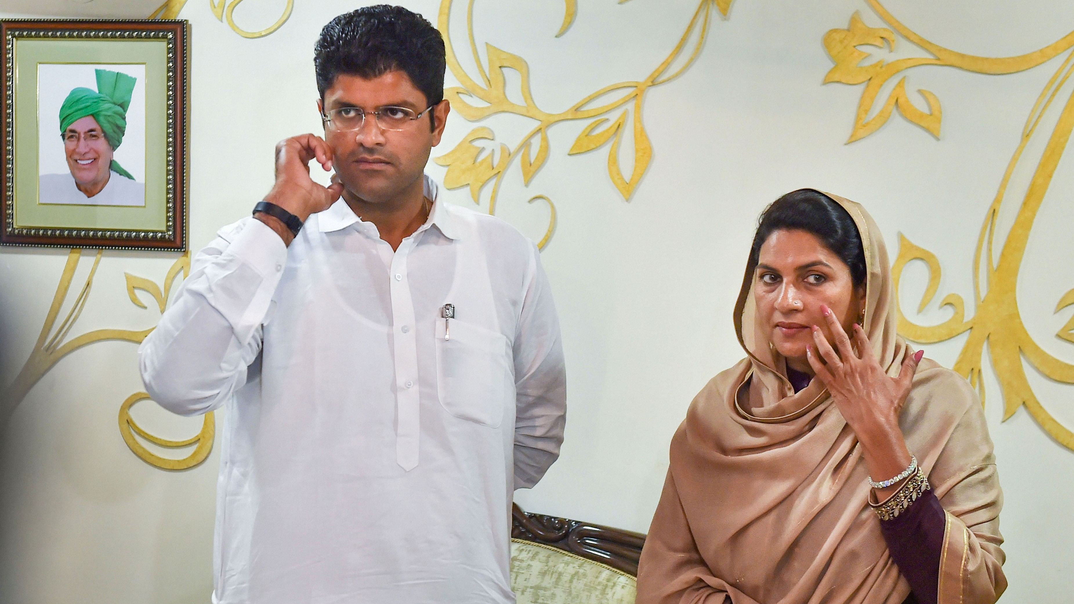 <div class="paragraphs"><p>Jannayak Janata Party chief Dushyant Chautala and his mother Naina Chautala.</p></div>