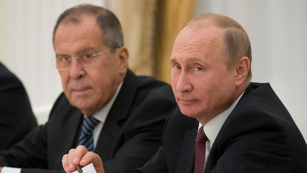 <div class="paragraphs"><p>Russia's President Vladimir Putin (R) and Foreign Minister Sergei Lavrov.</p></div>