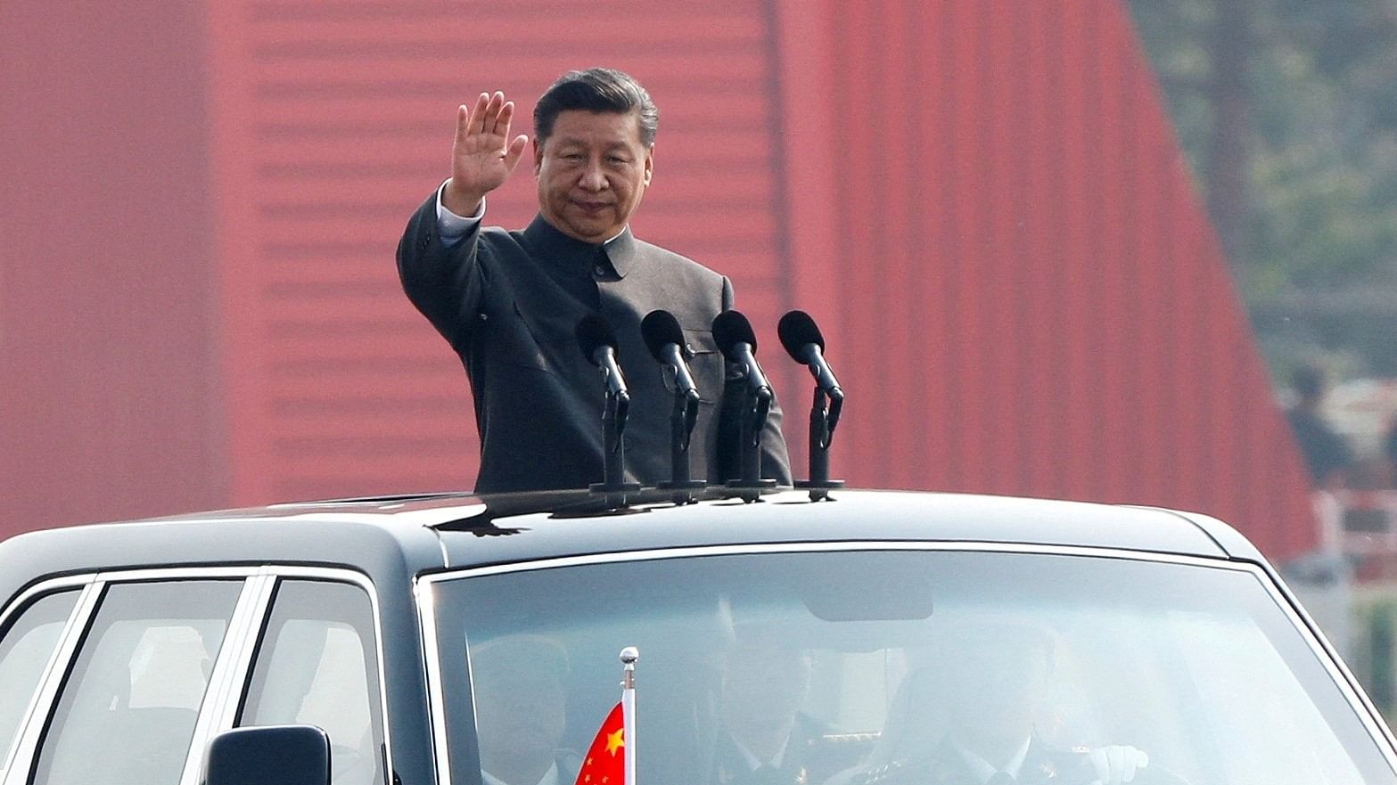 <div class="paragraphs"><p>FILE PHOTO: Chinese President Xi Jinping waves from a vehicle as he reviews the troops at a military parade marking the 70th founding anniversary of People's Republic of China, China October 1, 2019. </p></div>
