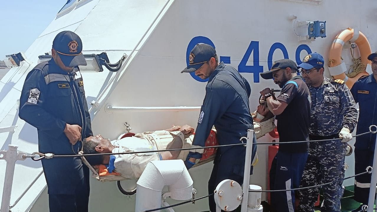 <div class="paragraphs"><p>Coast Guard helping the injured individual.&nbsp;</p></div>