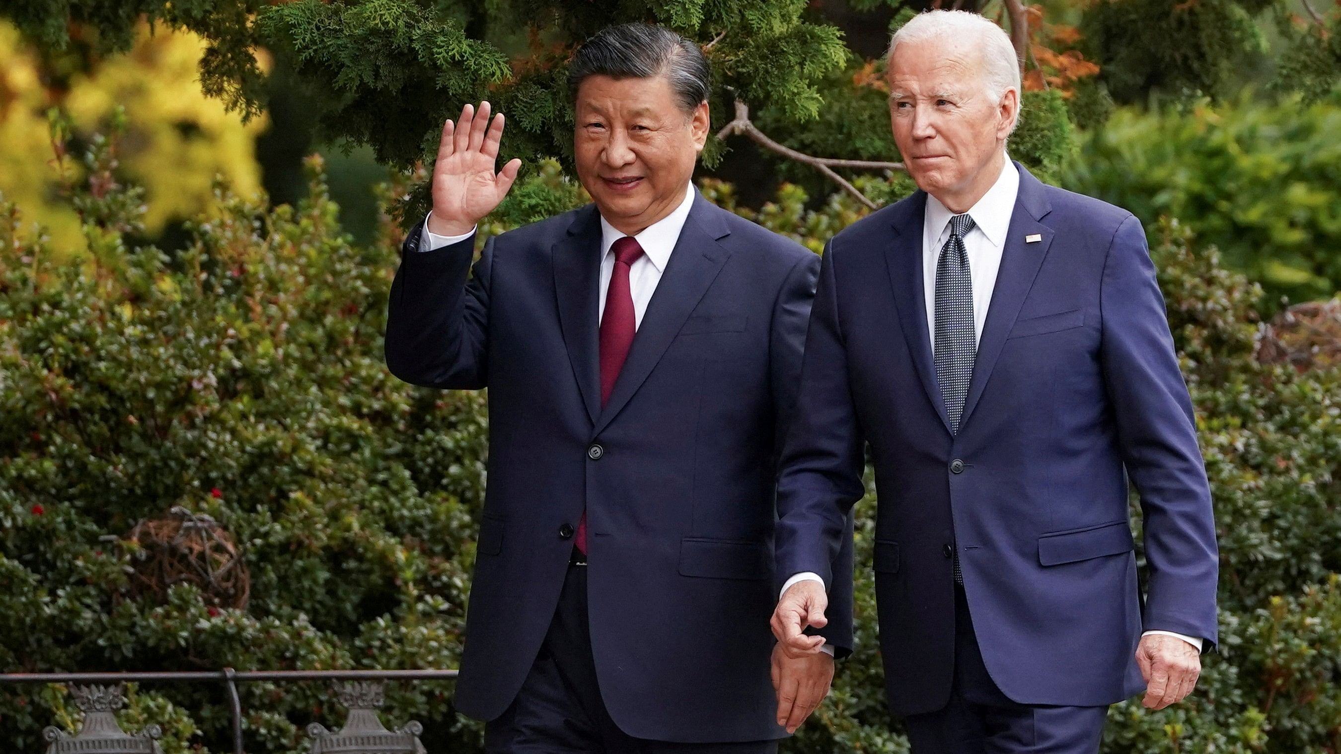 <div class="paragraphs"><p>File photo of&nbsp;Chinese President Xi Jinping waves as he walks with US President Joe Biden.</p></div>