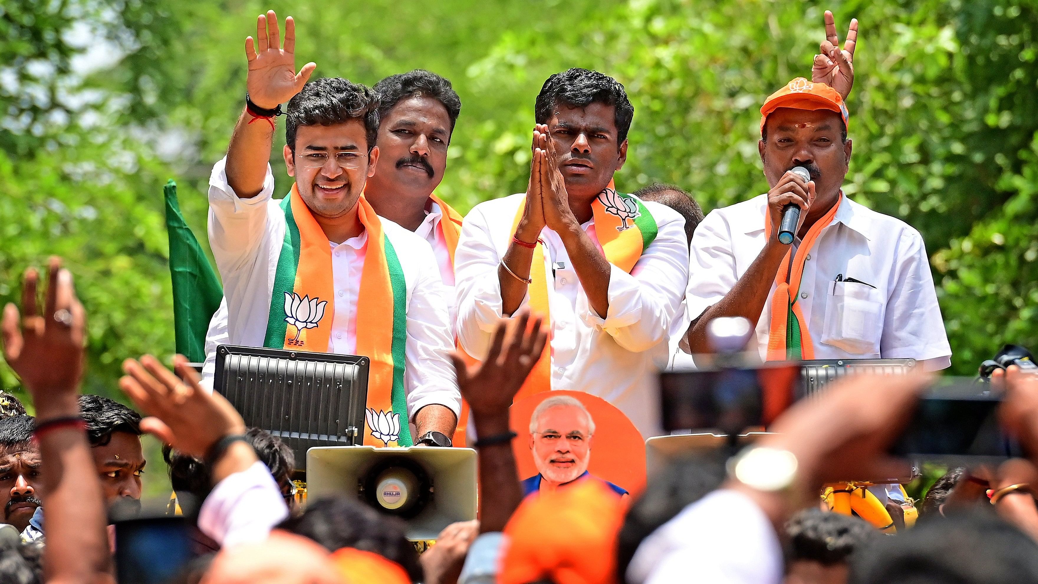 <div class="paragraphs"><p>Tejasvi Surya, the BJP candidate for the Bangalore South constituency, and Tamil Nadu party unit chief K Annamalai along with supporters at Siddapura on Monday. </p></div>