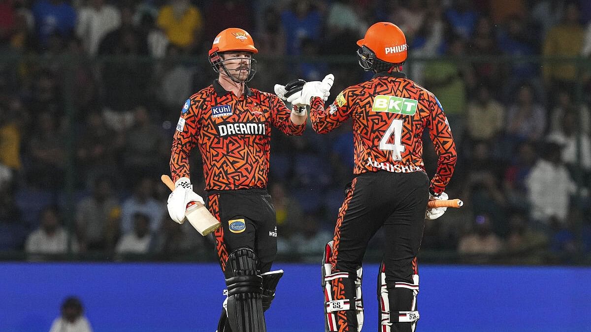 <div class="paragraphs"><p>Sunrisers Hyderabad batter Travis Head being greeted by Abhishek Sharma as he celebrates scoring fifty runs during the Indian Premier League (IPL) 2024 T20 cricket match between Delhi Capitals and Sunrisers Hyderabad at the Arun Jaitley Stadium, in New Delhi, Saturday, April 20, 2024.</p></div>