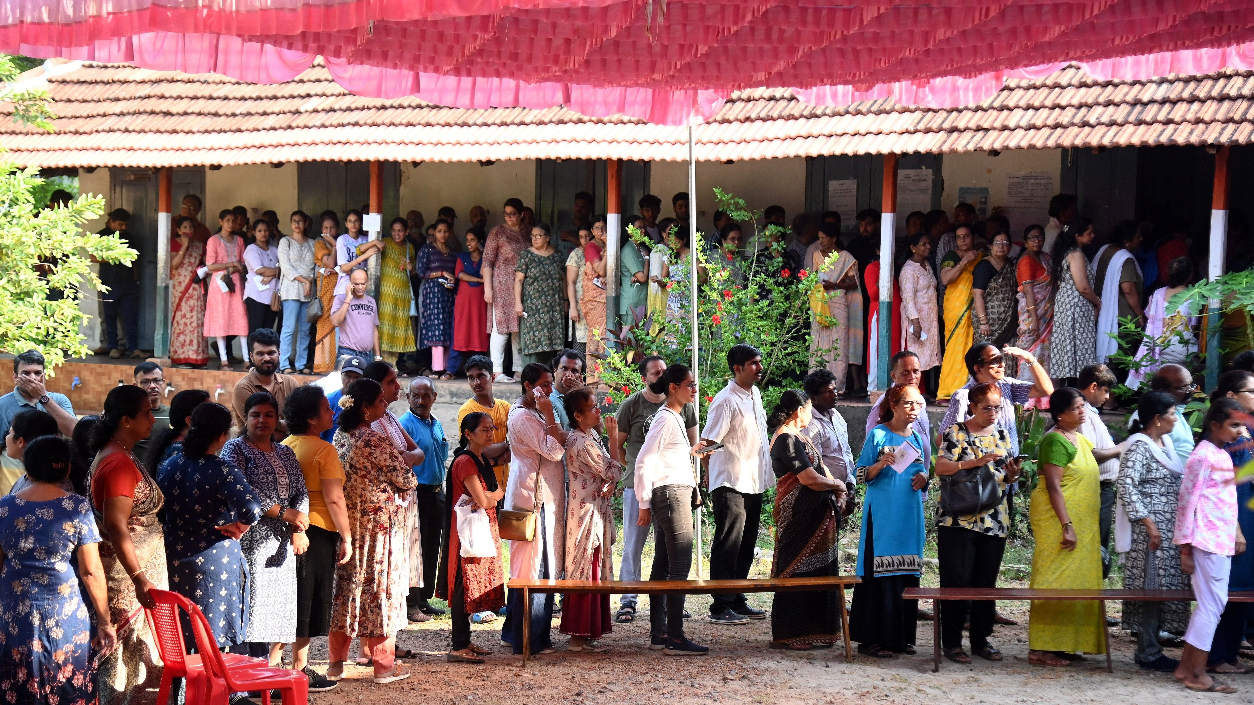 <div class="paragraphs"><p>  Voters wait for their turn in a queue to exercise their franchise at Government School in Kadri- Mallikatte in Mangaluru</p></div>