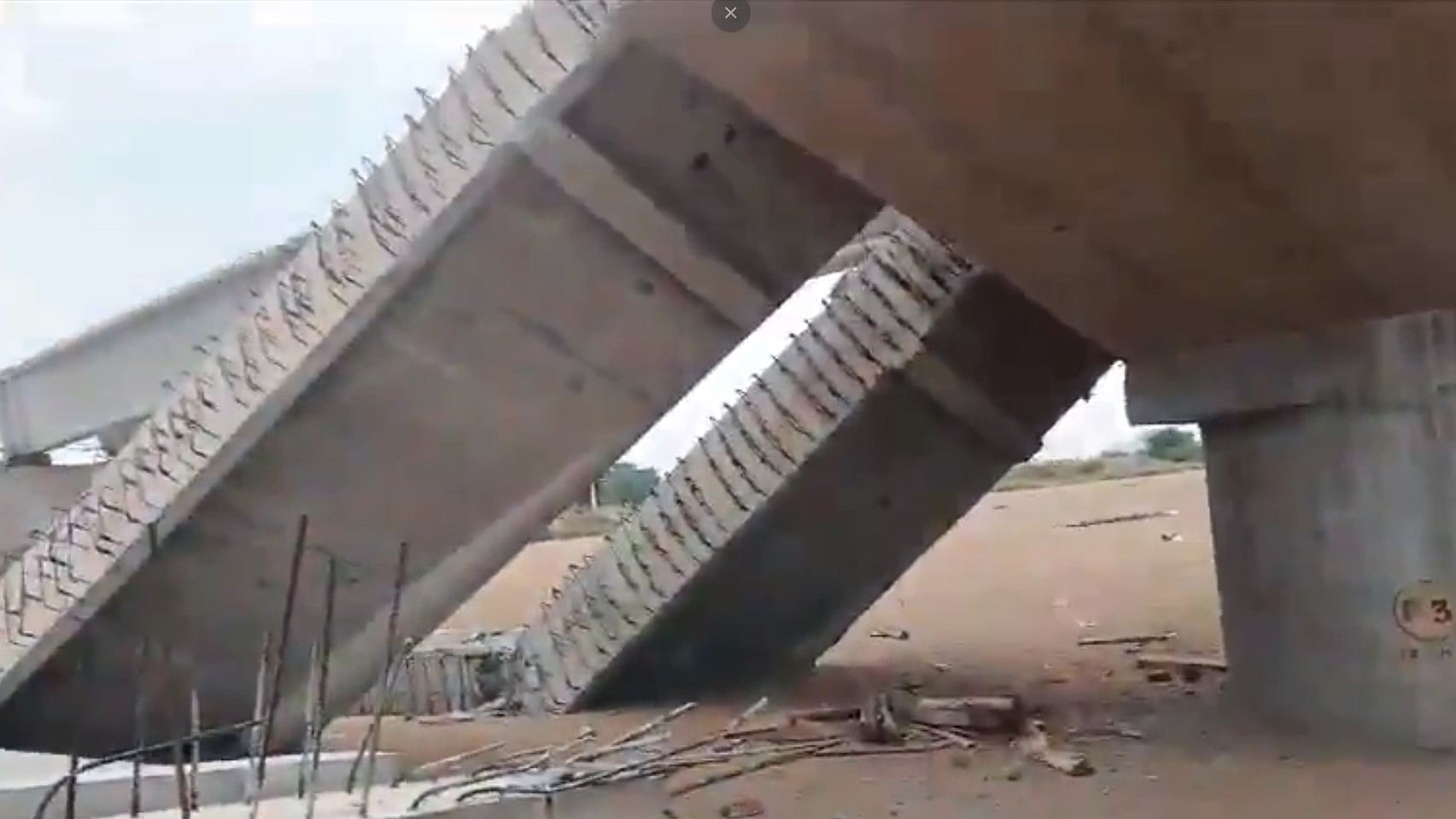 <div class="paragraphs"><p>A screengrab from a video showing a collapsed section of the bridge.</p></div>