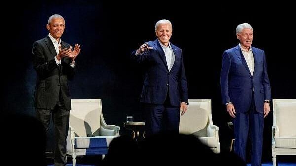 <div class="paragraphs"><p>US President Joe Biden, former US presidents, Barack Obama and Bill Clinton, participate in a discussion moderated by Stephen Colbert, host of CBS's 'The Late Show with Stephen Colbert', during a campaign fundraising event at Radio City Music Hall in New York on March 28, 2024.</p></div>