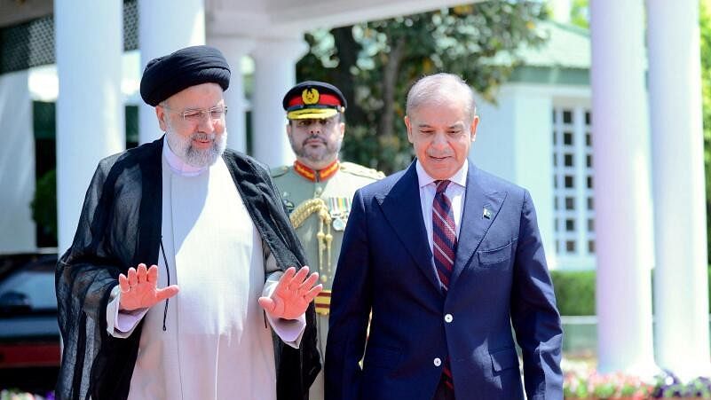 <div class="paragraphs"><p>Pakistan's Prime Minister Shehbaz Sharif welcomes Iranian President Ebrahim Raisi on his three-day official visit in Islamabad, Pakistan April 22, 2024.</p></div>