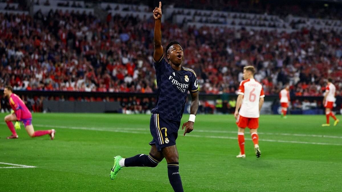 <div class="paragraphs"><p>Real Madrid's Vinicius Junior celebrates scoring their first goal in their Bayern Munich v Real Madrid match.</p></div>