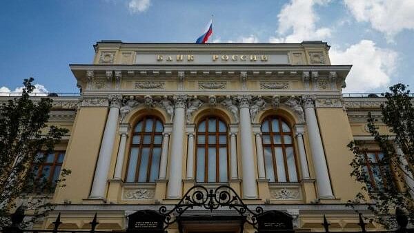 <div class="paragraphs"><p>A Russian state flag flies over the Central Bank headquarters in Moscow, Russia.</p></div>