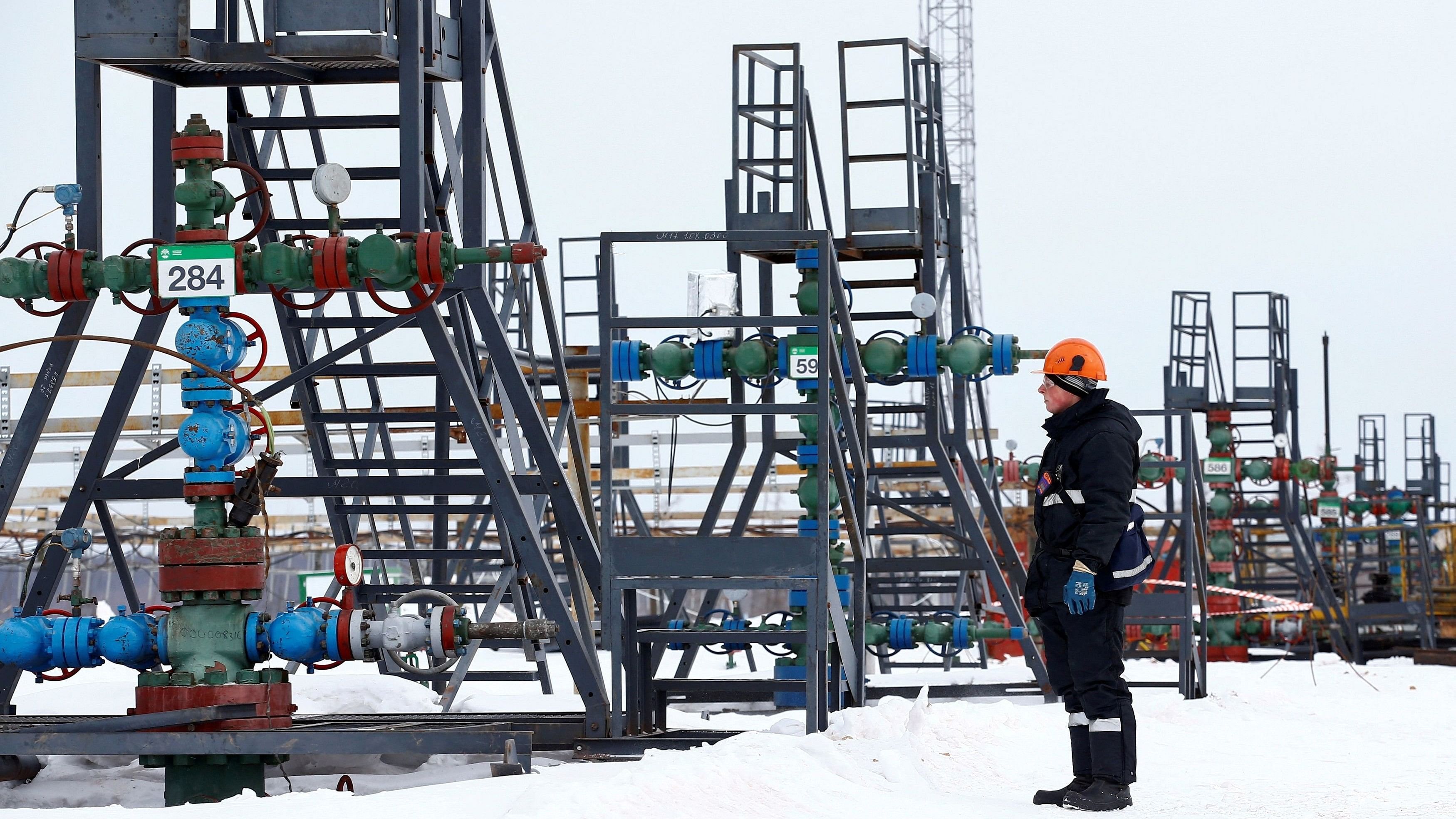 <div class="paragraphs"><p>File photo showing an employee inspecting a well head in the Yarakta Oil Field in Irkutsk Region, Russia. </p></div>
