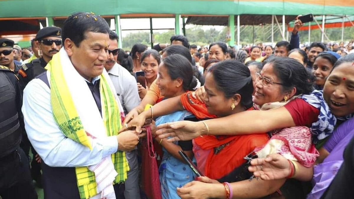 <div class="paragraphs"><p>Union Minister and BJP candidate for Dibrugarh Lok Sabha seat Sarbananda Sonowal during his election campaign for Lok Sabha polls in Dibrugarh.</p></div>