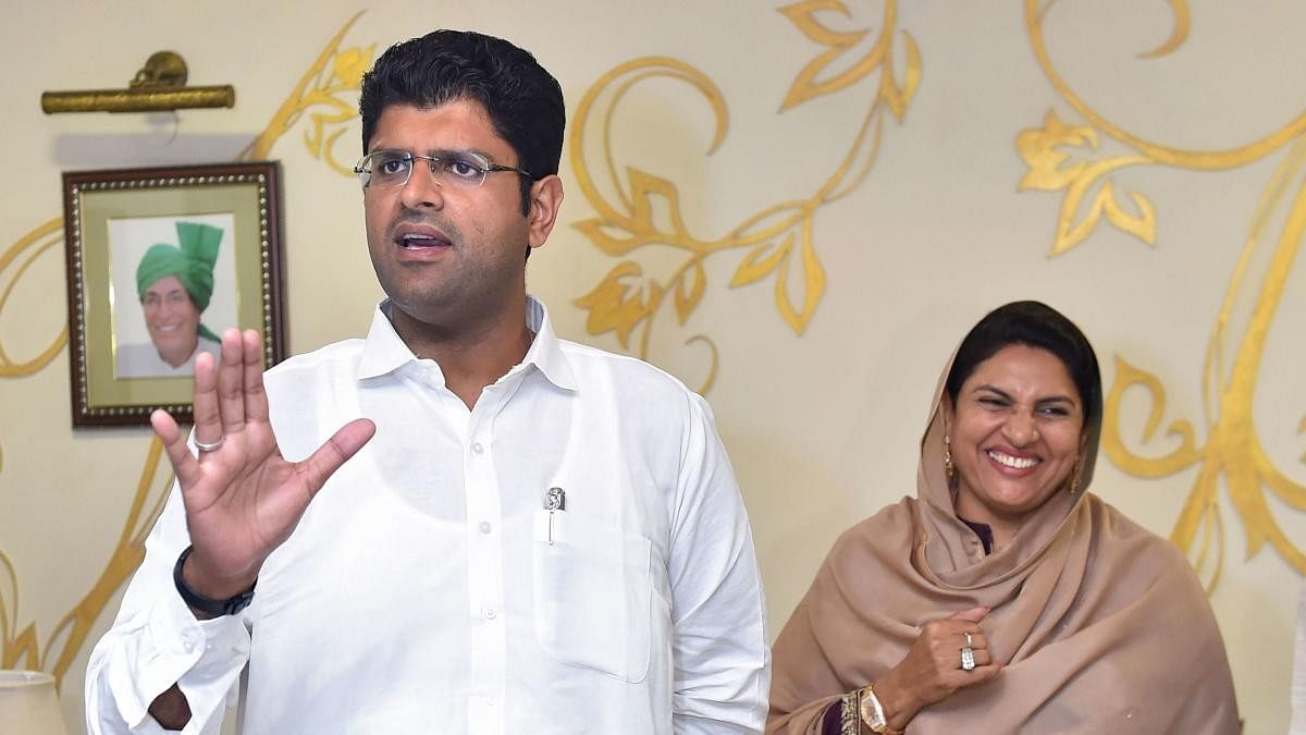 <div class="paragraphs"><p>Jannayak Janata Party chief Dushyant Chautala and his mother Naina Chautala. </p></div>