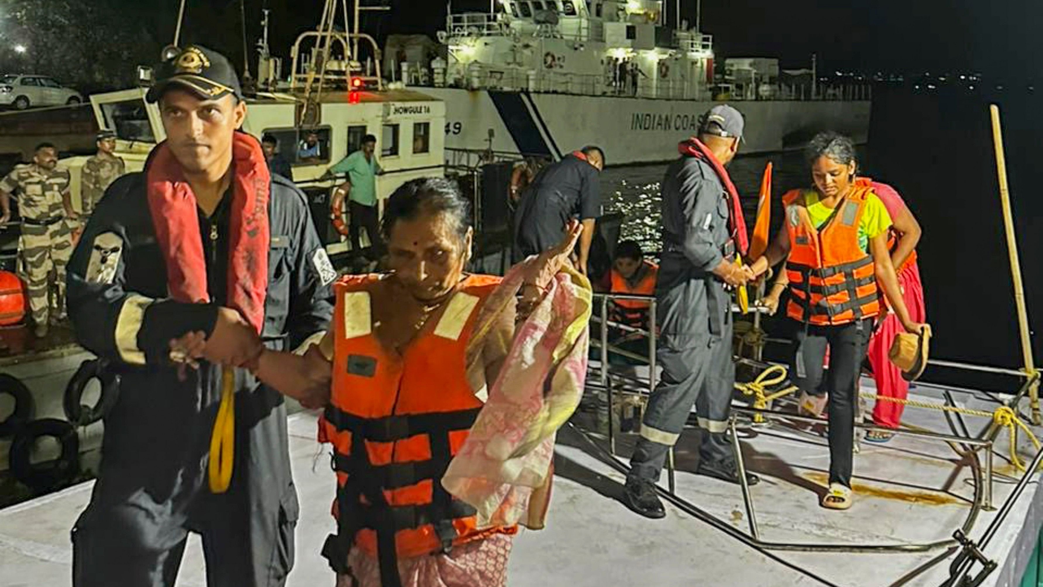 <div class="paragraphs"><p>Indian Coast Guard personnel rescue passengers from a tourist ferry boat which was caught in rough weather and faced fuel exhaustion near the Mormugao harbour in Goa. </p></div>