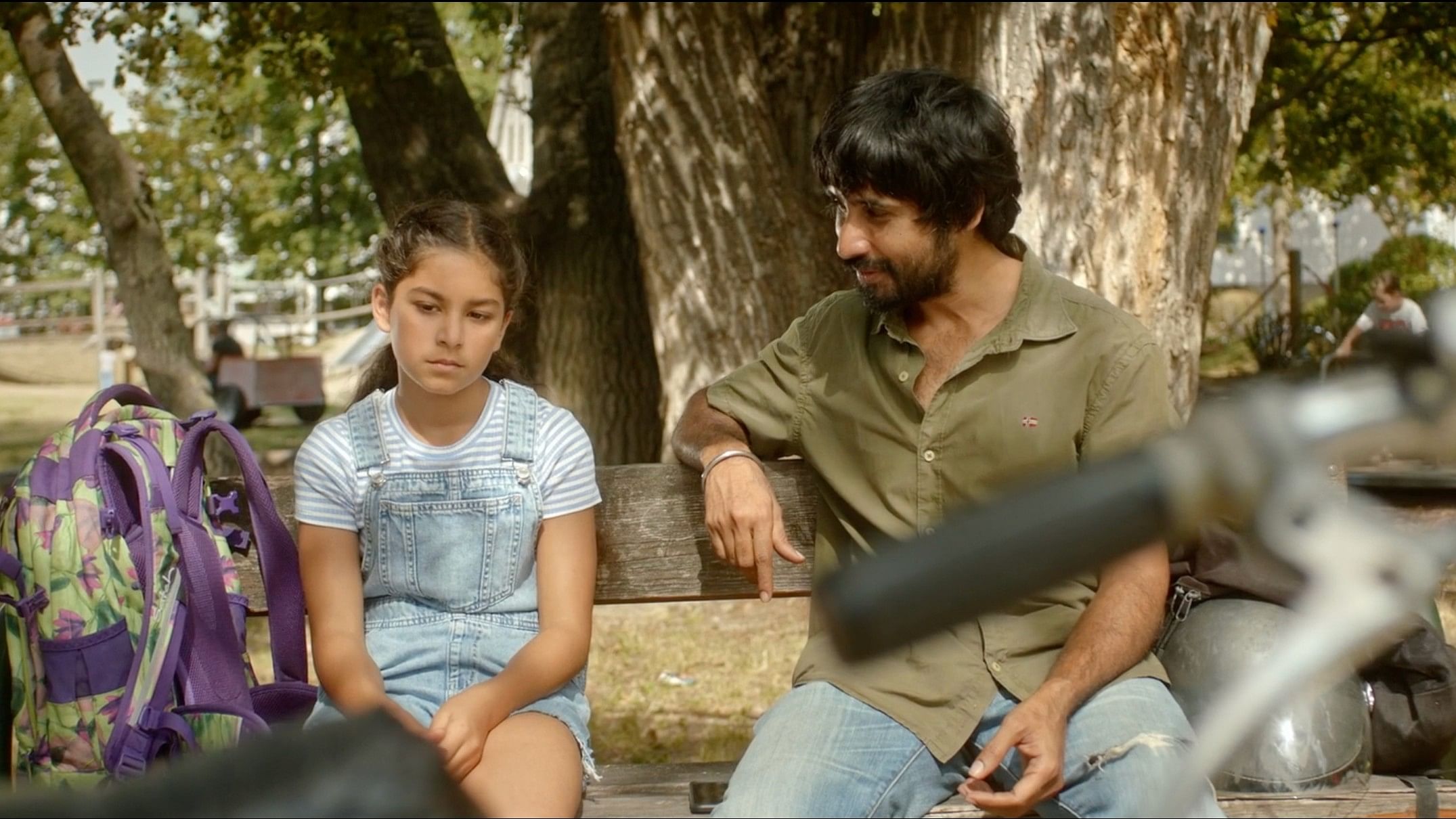 <div class="paragraphs"><p>A shot from the movie Happy, directed by Indian-origin Austrian filmmaker Sandeep Kumar. Indian actor Sahidur Rahman is seen in the picture with a kid.</p></div>