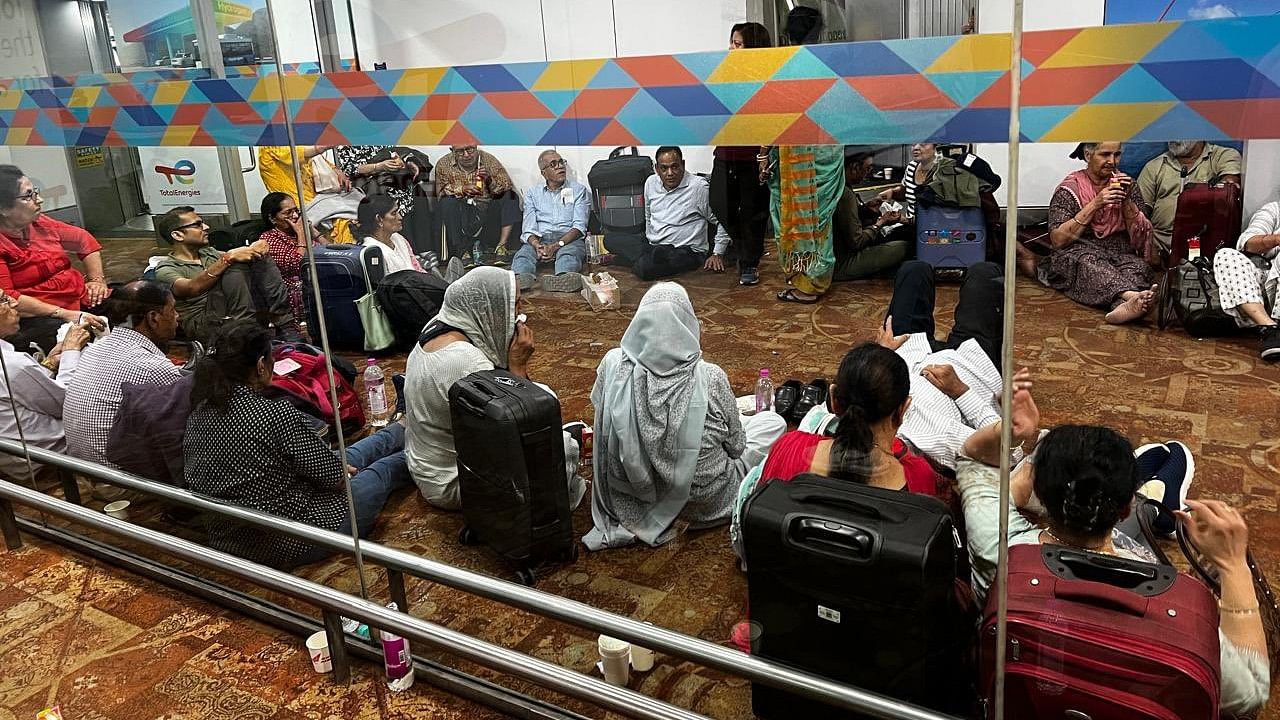 <div class="paragraphs"><p>Passengers wait amid flight delay</p></div>