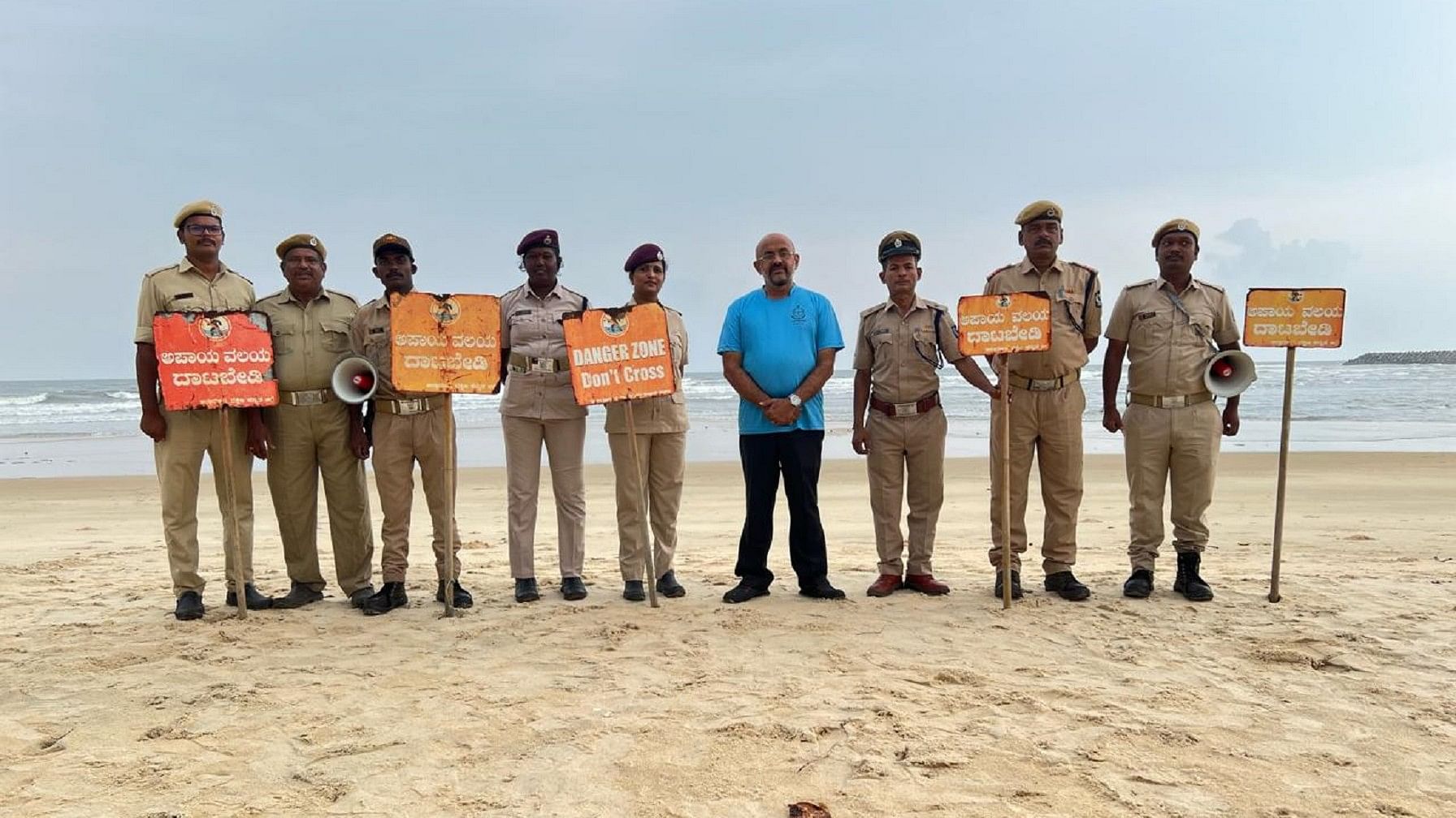 <div class="paragraphs"><p>District Home Guard Commandant Dr Murali Mohan Choontharu with home guards at Surathkal beach.</p></div>