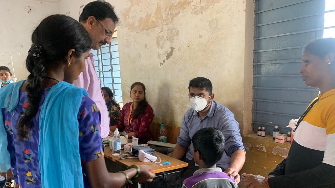 <div class="paragraphs"><p>Patients being treated at a temporary clinic in K Salundi.</p></div>