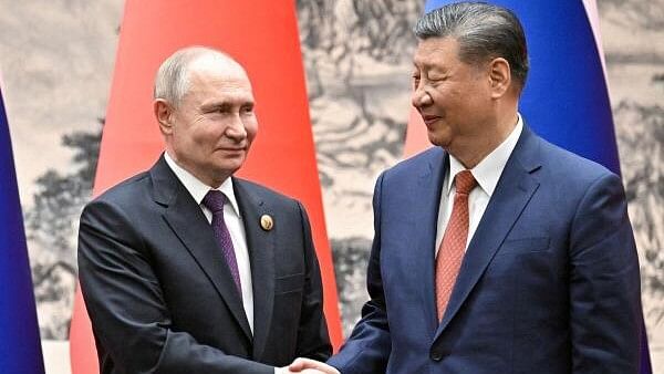 <div class="paragraphs"><p>Russian President Vladimir Putin shakes hands with Chinese President Xi Jinping during a meeting in Beijing, China May 16, 2024.</p></div>