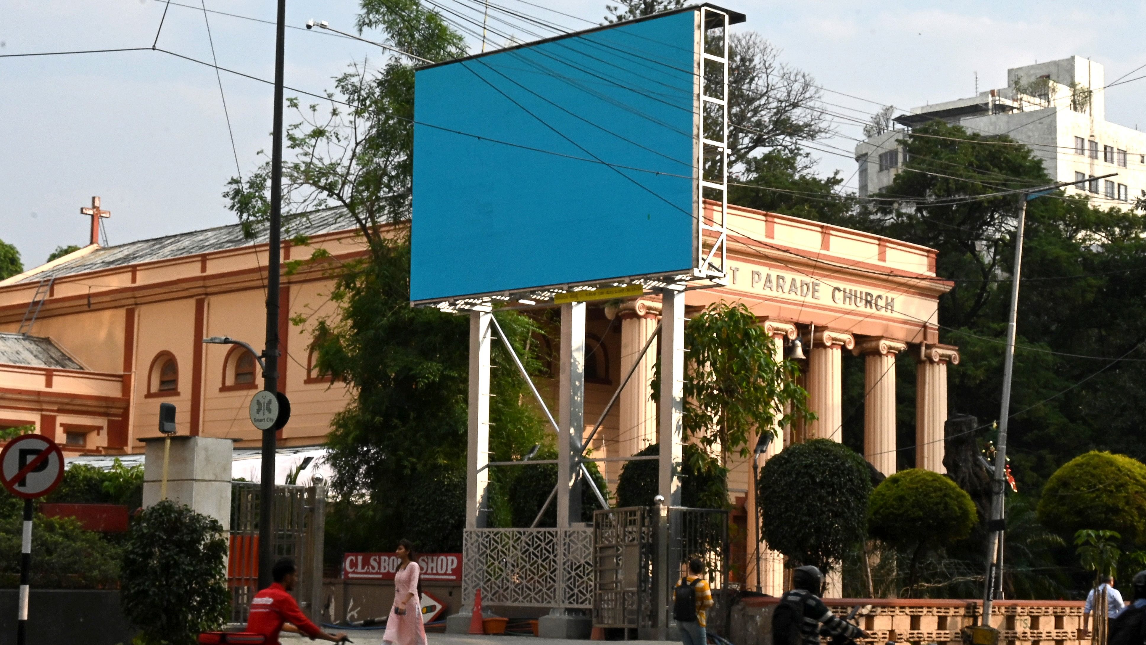 <div class="paragraphs"><p>Billboard at Dickenson Road in Bengaluru on Thursday</p></div>