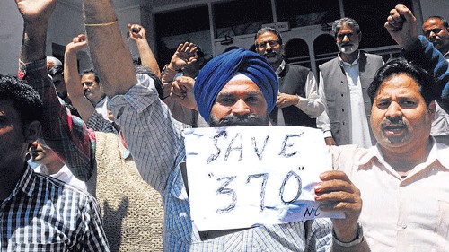 <div class="paragraphs"><p>File photo of activists protesting against the revocation of Article 370. </p></div>