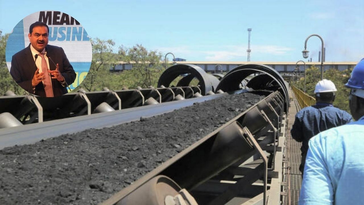 <div class="paragraphs"><p>Coal being supplied from an Adani port is seen in this image, with a photo of Gautam Adani on the left</p></div>