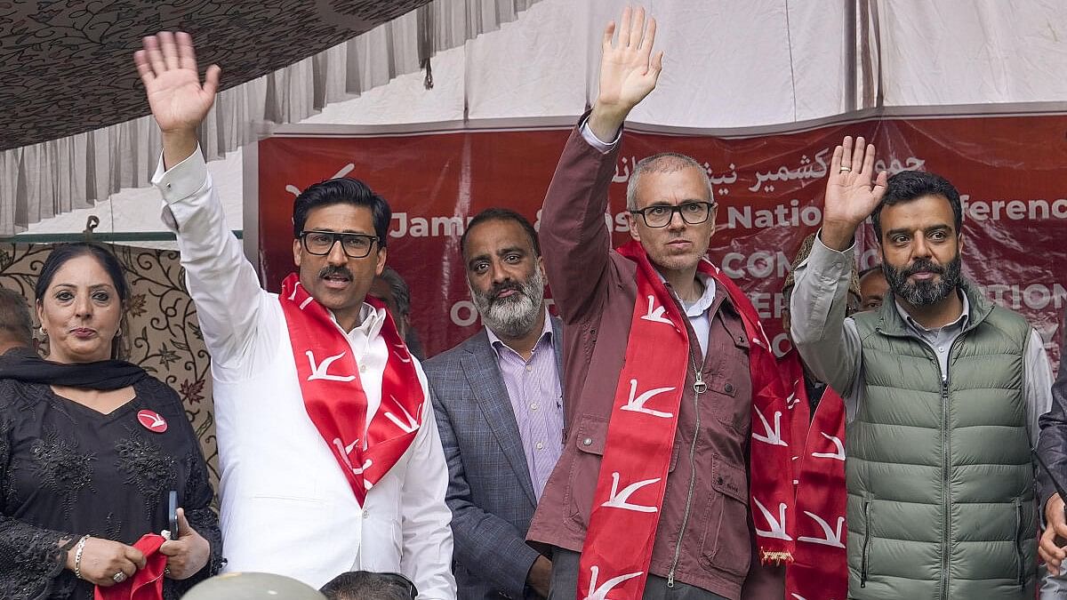 <div class="paragraphs"><p>National Conference leader Omar Abdullah and party candidate Aga Ruhullah Mehdi during a public meeting for Lok Sabha elections, in Srinagar.</p></div>
