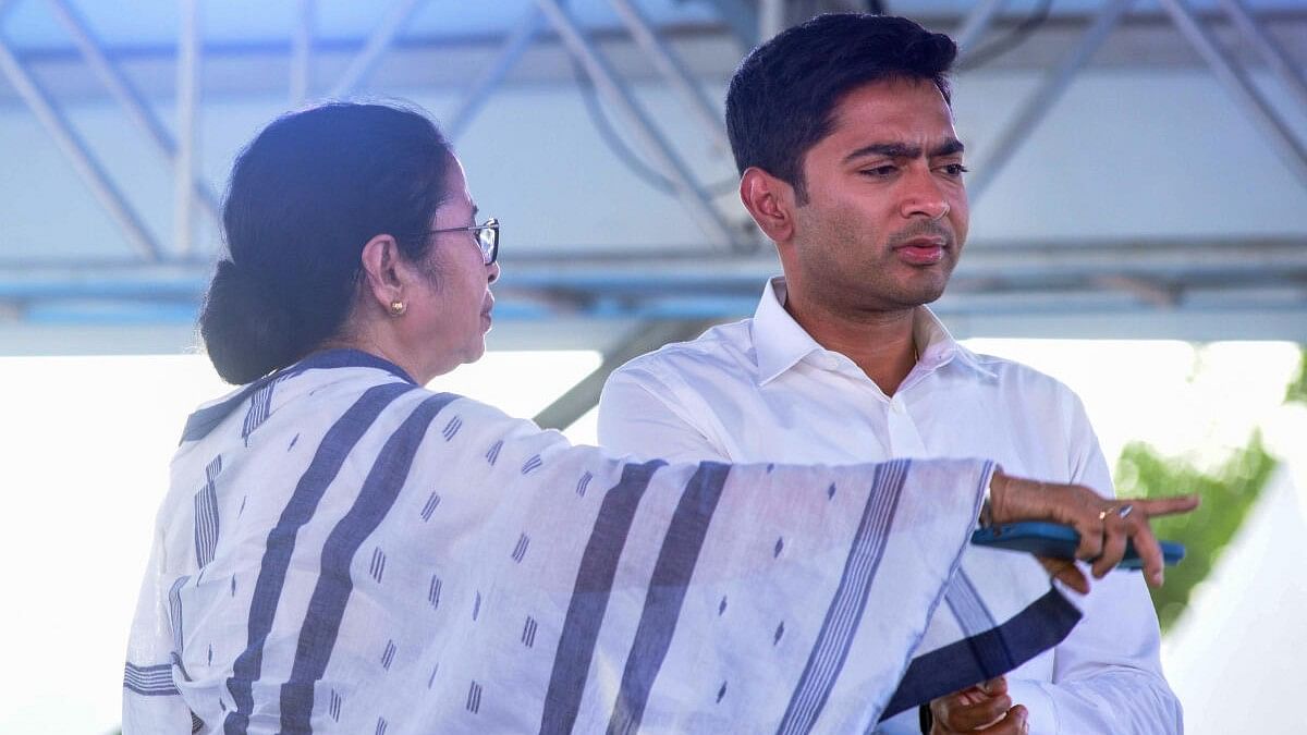 <div class="paragraphs"><p>West Bengal Chief Minister Mamata Banerjee with party leader Abhishek Banerjee.&nbsp;</p></div>