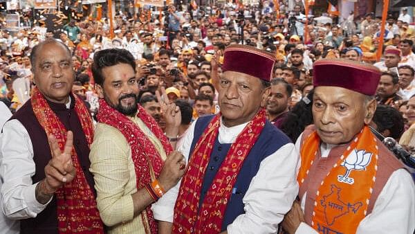 <div class="paragraphs"><p>Union Minister and BJP candidate from Hamirpur constituency Anurag Thakur with former Himachal Pradesh chief minister Prem Kumar Dhumal, Leader of Opposition in the state Assembly Jairam Thakur and the state BJP President Rajeev Bindal during a public meeting for the Lok Sabha elections, in Hamirpur district, Saturday, May 11, 2024.</p></div>