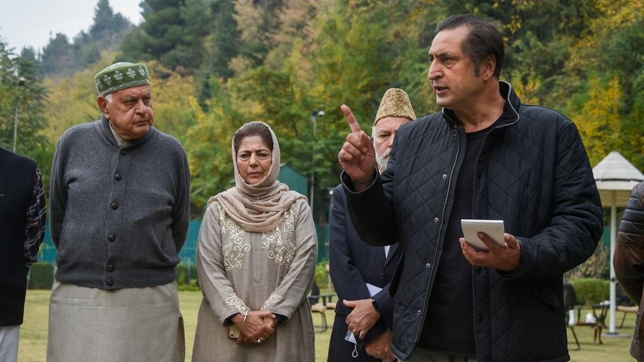 <div class="paragraphs"><p>File photo: Farooq Abdullah and Mehbooba Mufti look on as Sajjad Lone speaks to the media after a meeting of the People's Alliance for Gupkar Declaration (PAGD) before he left the alliance in 2021. </p></div>