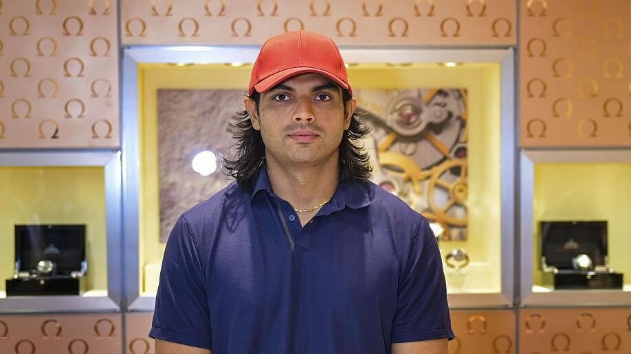 <div class="paragraphs"><p>Olympic Gold medalist Javelin thrower Neeraj Chopra posing for photos during an event.</p></div>