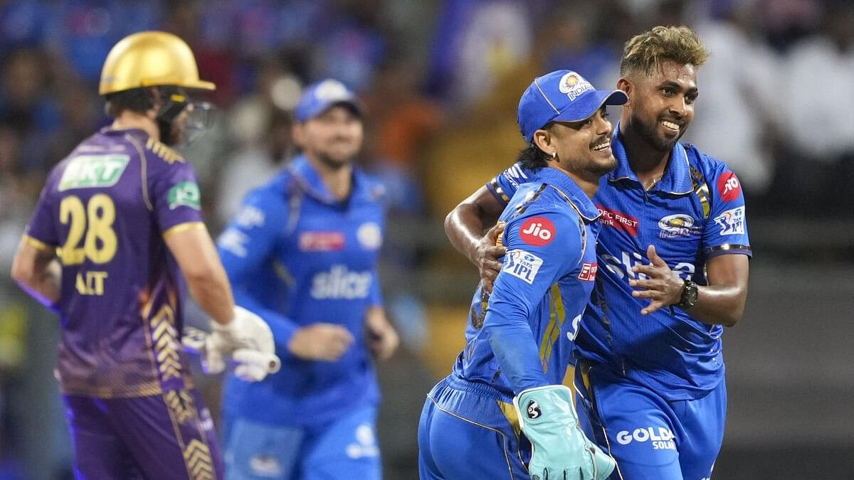 <div class="paragraphs"><p>Mumbai Indians' Nuwan Thushara celebrates after dismissing KKR's player Phil Salt during the IPL match in Mumbai.</p></div>