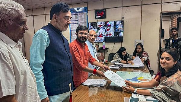 <div class="paragraphs"><p>Congress candidate from North East Delhi Kanhaiya Kumar files his nomination papers for Lok Sabha polls in the presence of AAP leader Gopal Rai, in New Delhi, Monday on May 6, 2024.</p></div>