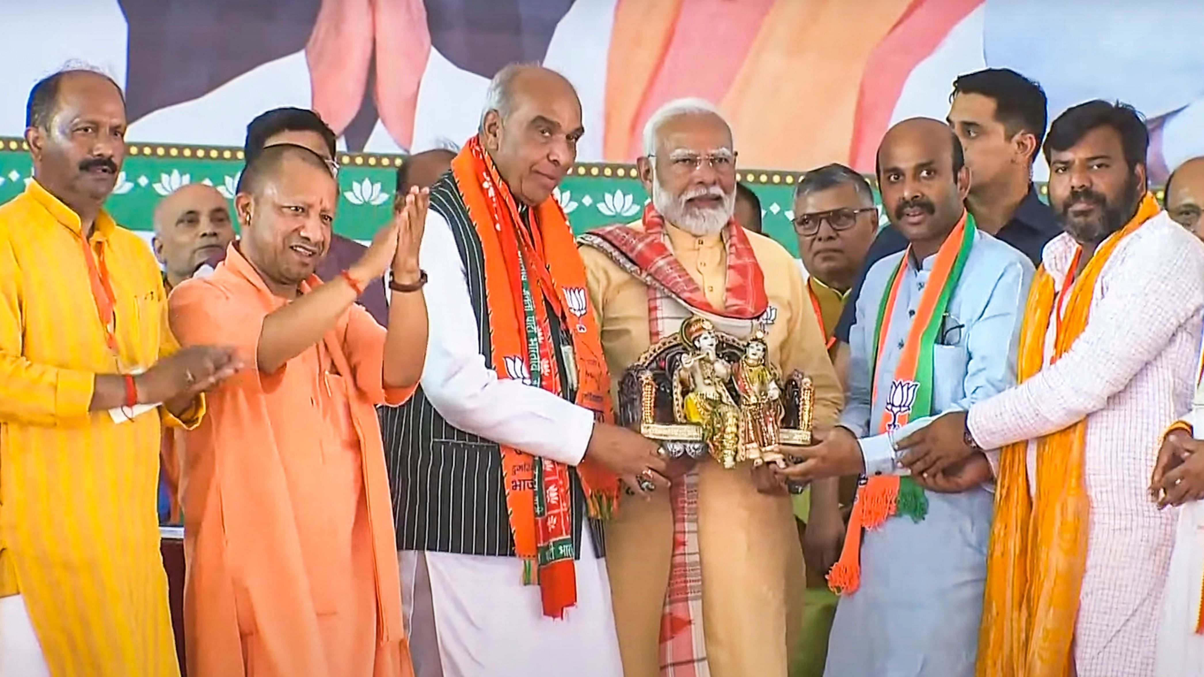 <div class="paragraphs"><p>File Photo: Prime Minister Narendra Modi being felicitated during a public meeting for the Lok Sabha elections, in Basti, Wednesday, May 22, 2024. </p></div>