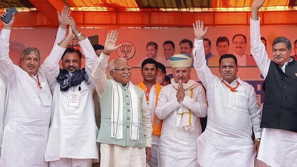 <div class="paragraphs"><p>Former Haryana chief minister and BJP candidate from Karnal constituency Manohar Lal and Union Minister of State and BJP candidate from Gurugram Rao Inderjit Singh during a rally for Lok Sabha elections, in Nuh district.</p></div>