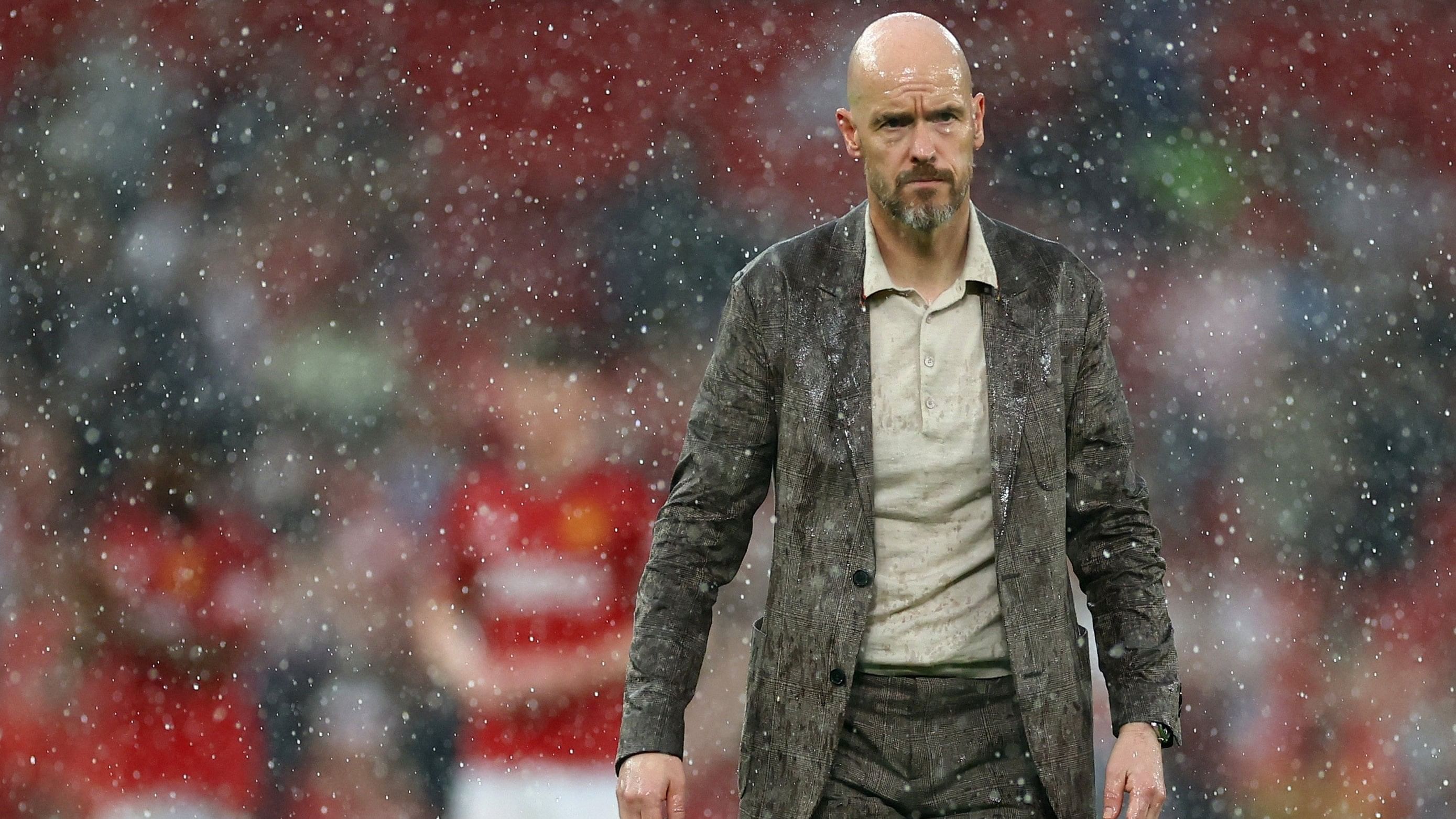 <div class="paragraphs"><p>Manchester United manager Erik ten Hag looks on after the match as rain falls during the&nbsp; Manchester United v Arsenal match at Old Trafford, Manchester, Britain on May 12, 2024.</p></div>