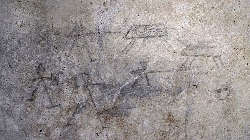 <div class="paragraphs"><p>Charcoal sketches of gladiators and hunters drawn by&nbsp;children in ancient Rome discovered on the walls of a service courtyard, in the house of the colonnaded Cenacle on Via dell'Abbondanza in Pompeii.</p></div>