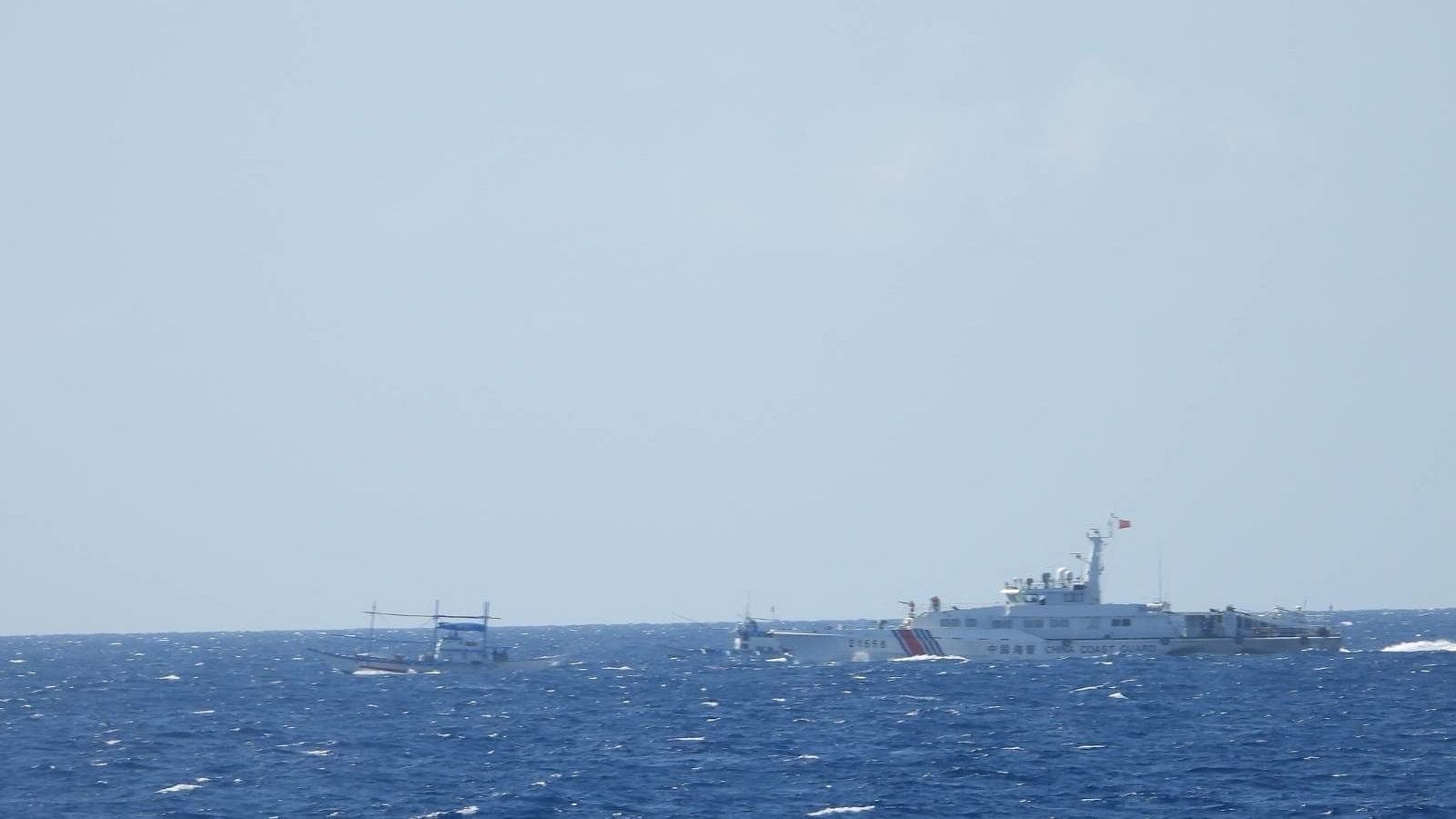 <div class="paragraphs"><p>A Chinese coastguard vessel approaches a Filipino fishing vessel in the South China Sea on April 4, 2024, in a handout photo by the Philippine Coast Guard that was released on April 6, 2024. </p></div>