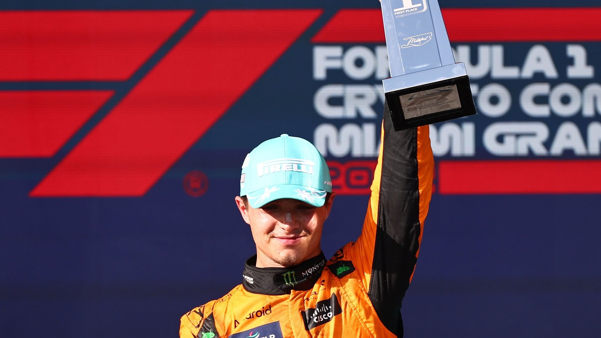 <div class="paragraphs"><p>McLaren's British driver Lando Norris celebrates with his trophy on the podium after winning the 2024 Miami Formula One Grand Prix at Miami International Autodrome in Miami Gardens, Florida.</p></div>