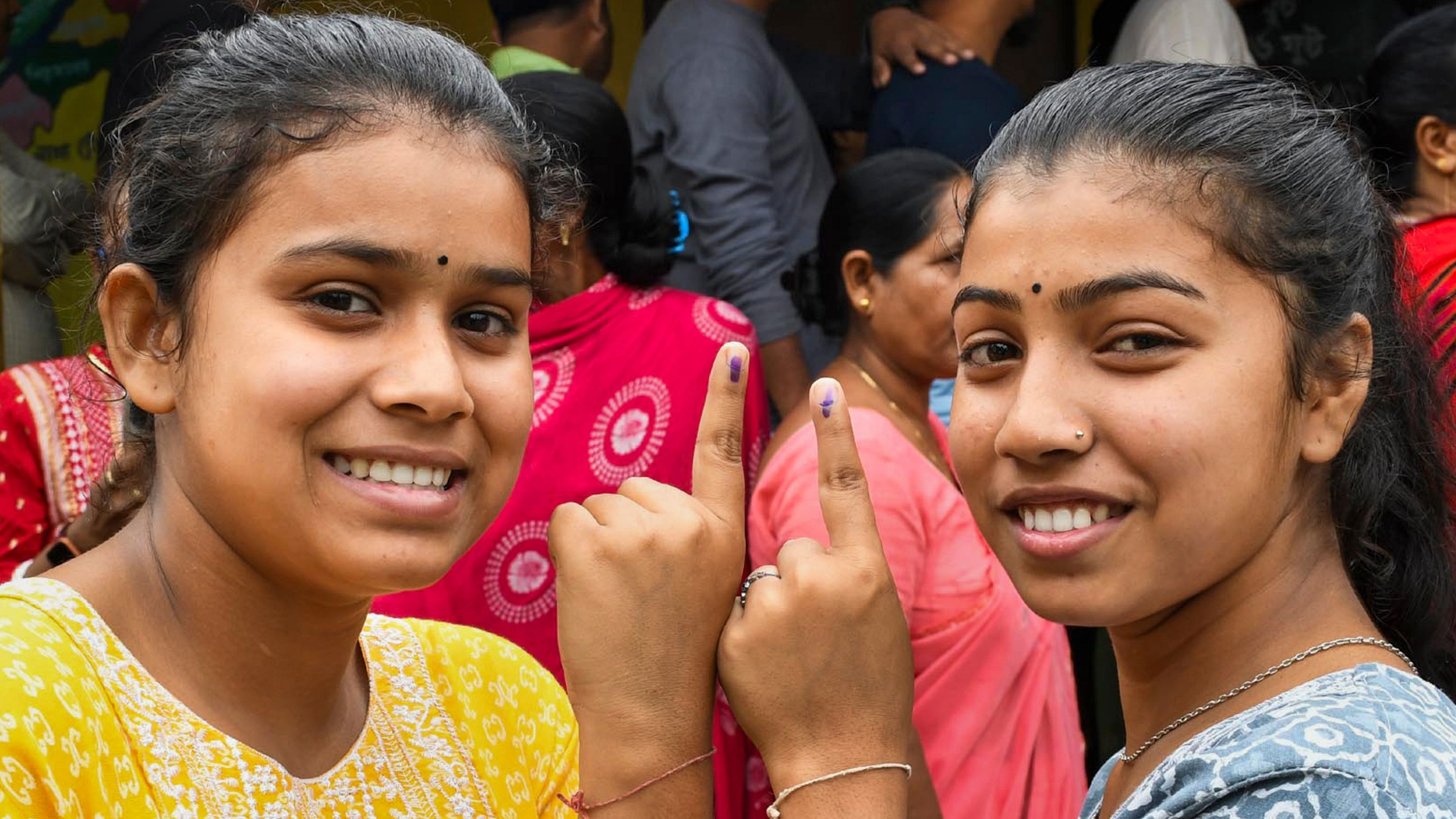 <div class="paragraphs"><p>First time voters show their fingers marked with indelible ink after casting vote for the third phase of Lok Sabha elections, in Kamrup, Assam.</p></div>